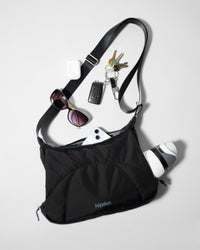 Bottle Bag in Black Crinkle Nylon / Dusty Blue, contents spilled out